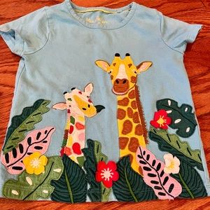Mini Boden short sleeve shirt with embroidered giraffe print & appliqué flowers